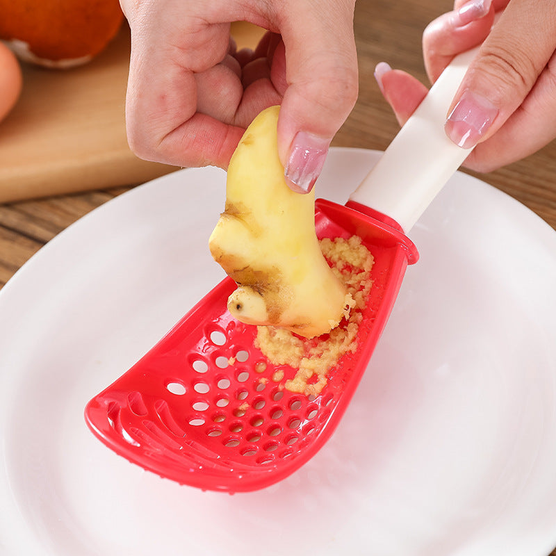 Multi-Function Slotted Grinding & Cooking Spoon (black - Red)